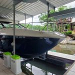 Ski boat on a boat lift at Lake of the Ozarks